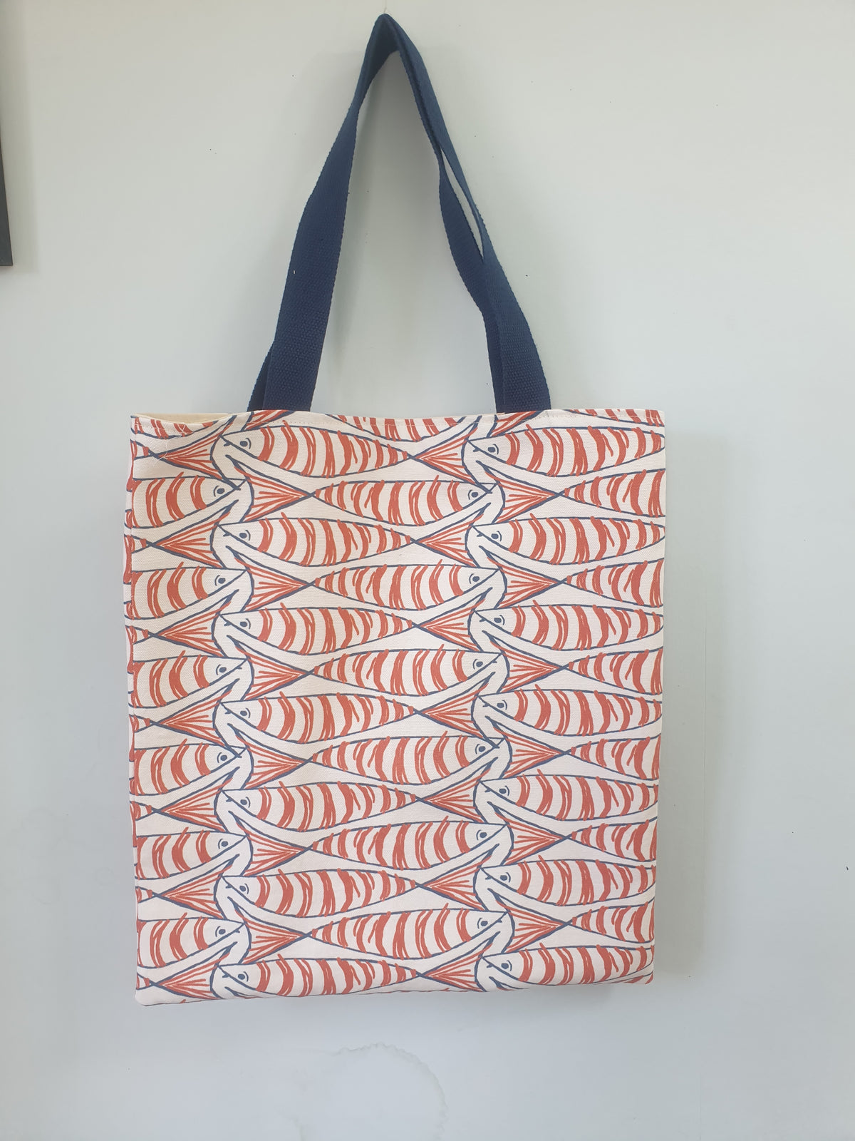 Handmade tote bag with red sprats fish print and navy cotton handles